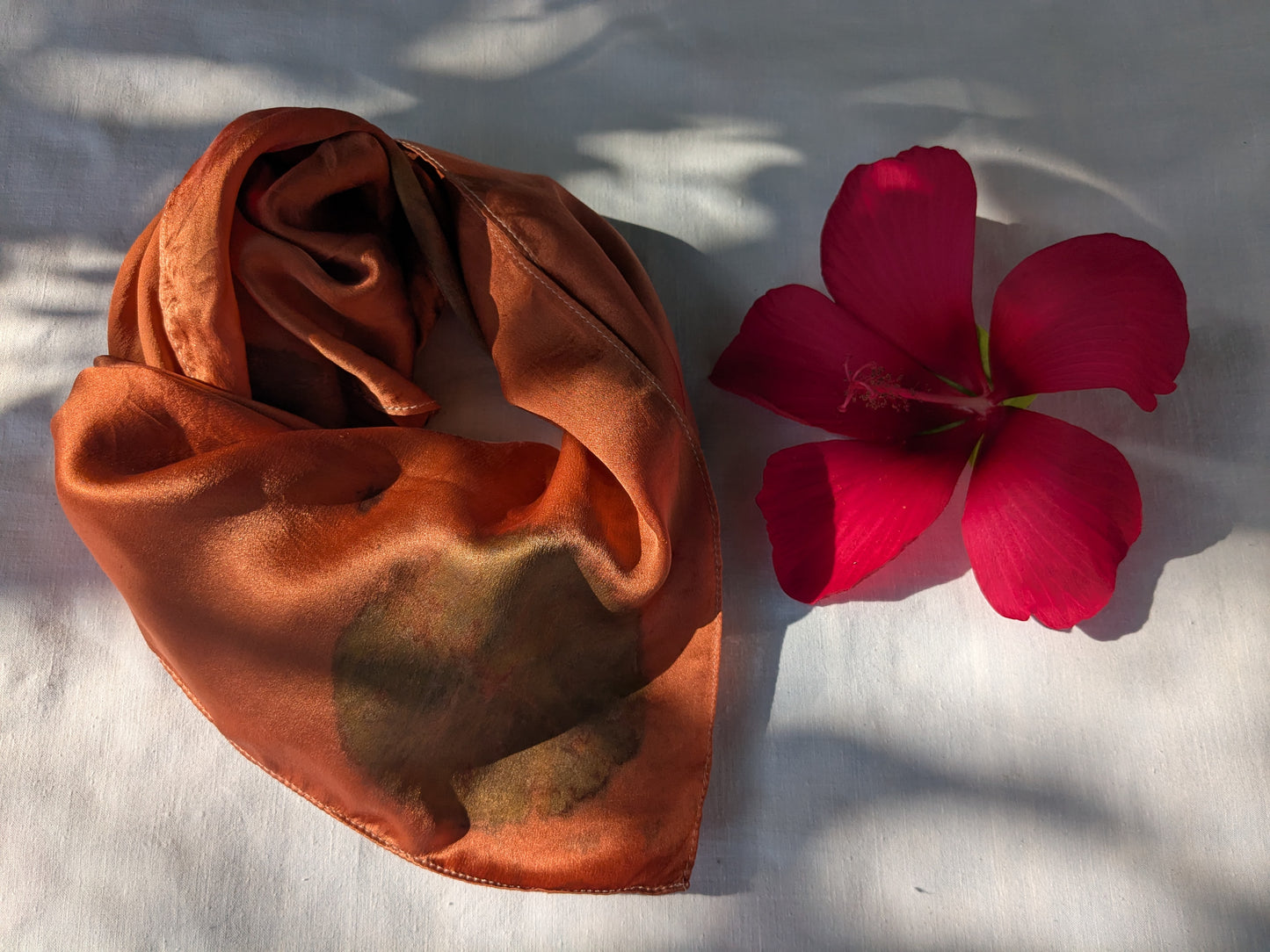 Eco printed red silk scarf with smokebush leaves