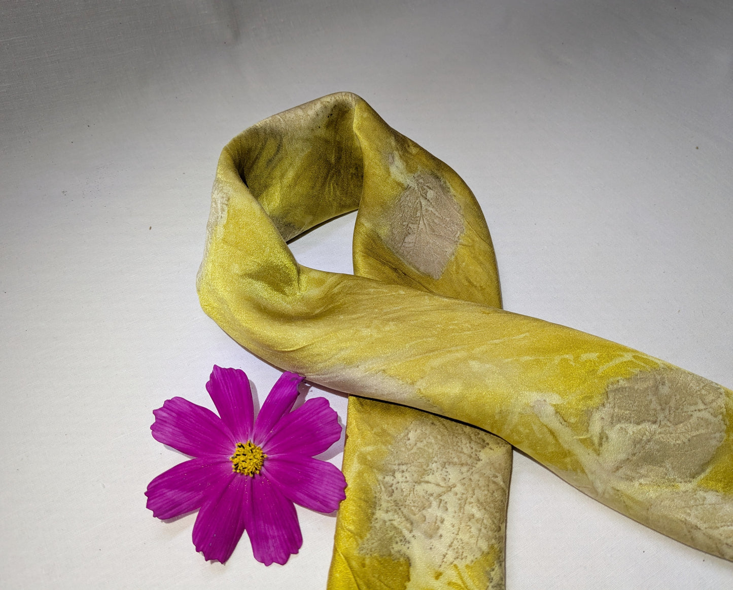 Marigold dyed natural silk scarf, eco printed with blackberry leaves