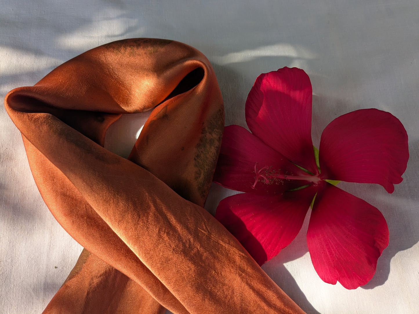 Eco printed red silk scarf with smokebush leaves