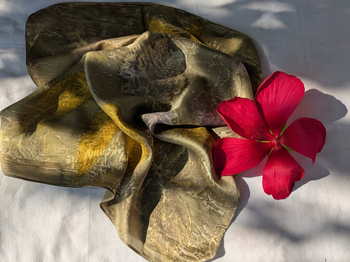 Pomegranate dyed silk scarf, eco printed with geranium leaves