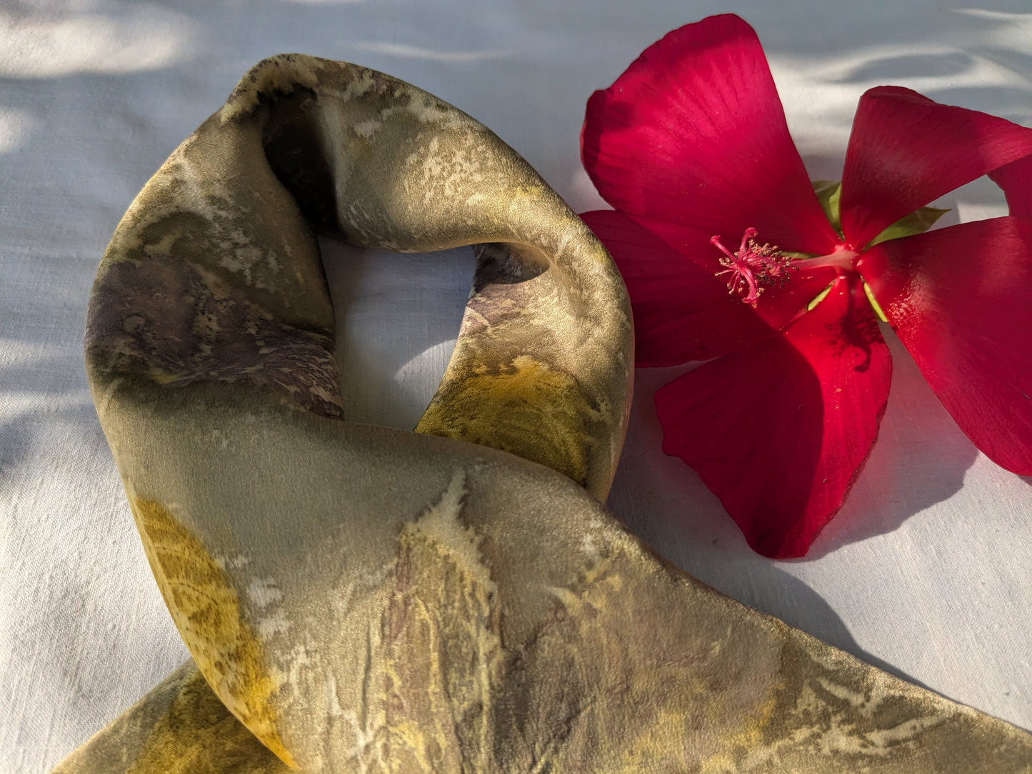 Pomegranate dyed silk scarf, eco printed with geranium leaves