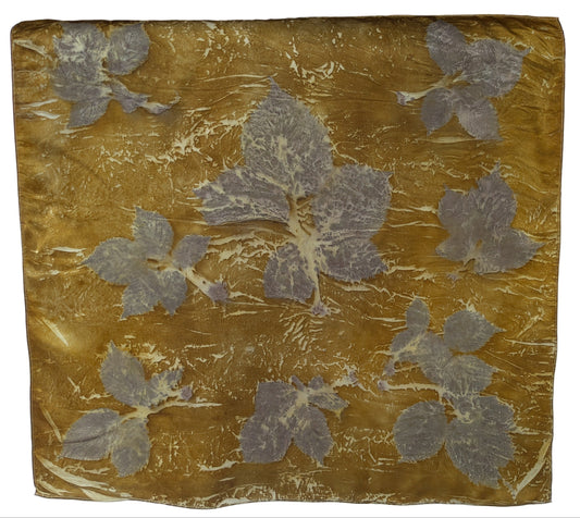 Yellow eco printed silk scarf with berry leaves