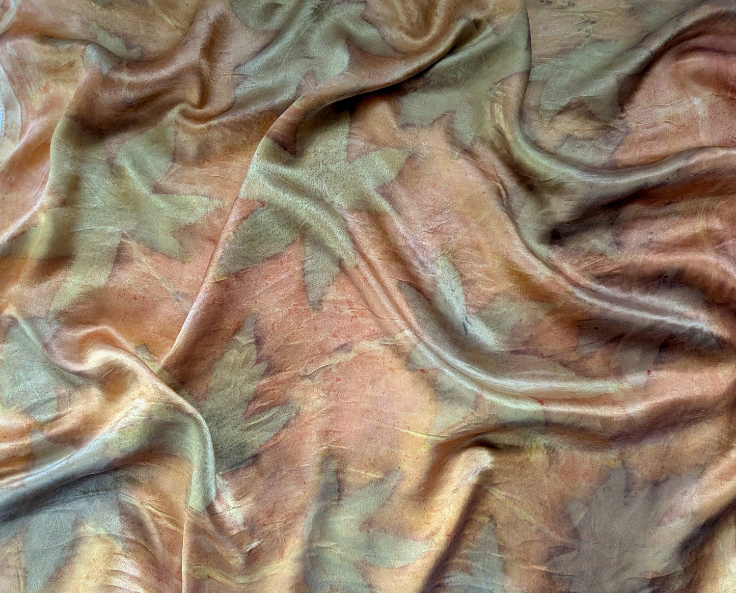 Orange colored silk satin scarf, eco printed with leaves