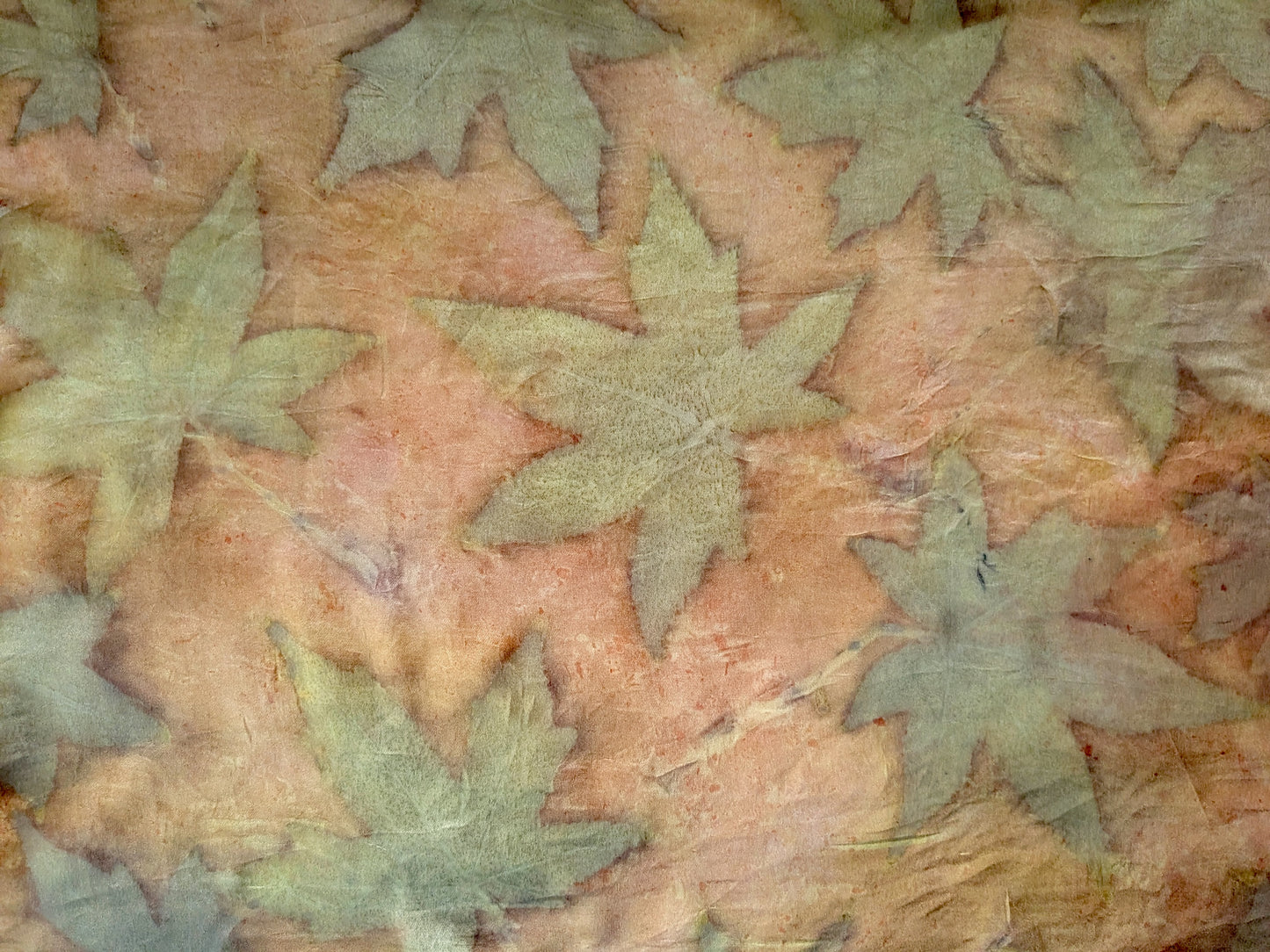 Orange colored silk satin scarf, eco printed with leaves