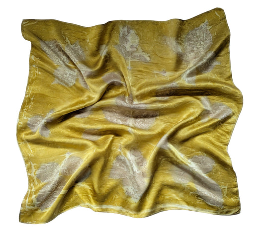 Yellow fabric with floral pattern on a white background